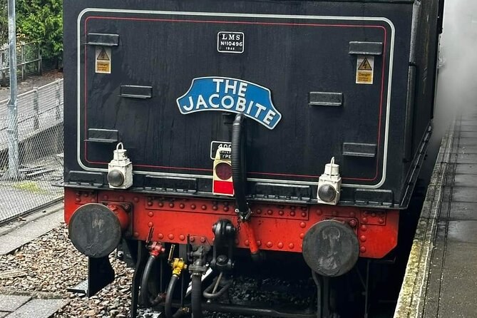 The Jacobite headboard on the back of a black locomotive tender