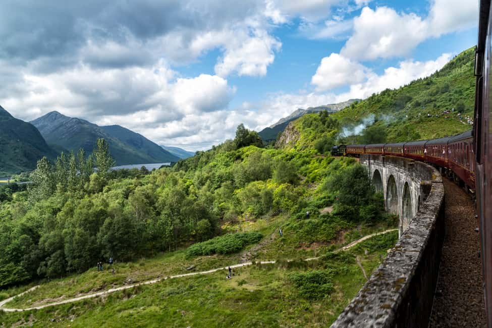 The view from a carriage window as the train curves onto the viaduct